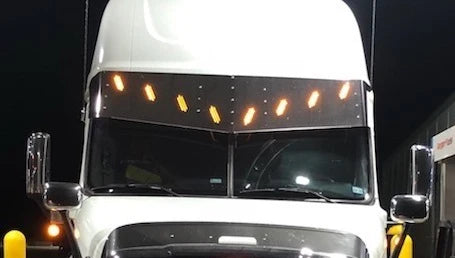 Freightliner Cascadia Sun visor with 8 Slotted Light Holes (2008-2017)